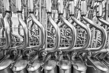 A galvanic steel muffler equipment with welded tailpipe and exhaust tube, designed for optimal...