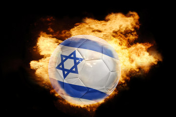 Fototapeta premium football ball with the flag of israel on fire