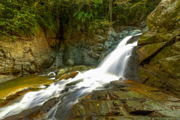 Obraz premium Experience the breathtaking beauty of a stunning waterfall scene in Ecuador,located just north of Quito.
