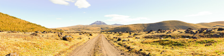 Discover the scenic route winding towards Sincholagua Volcano adorned with telltale signs of past volcanic eruptions featuring sizable volcanic rocks shaped by natural forces