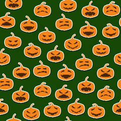 Seamless pattern with halloween pumpkins on dark green backgroun