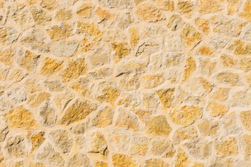 Rustic old stone wall texture background