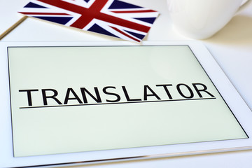 flag of the United Kingdom and the word translator in a tablet
