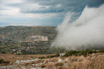 Fototapeta na wymiar Cloud over the croatian valley