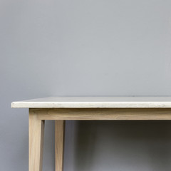 Empty top of white mable stone table on grey wall background
