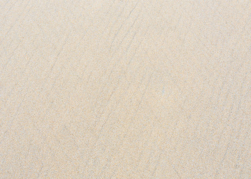Sand texture on the beach for background