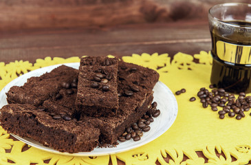 On a wooden table on yellow napkin