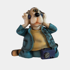 Figure of a doggie with radio and earphones