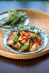 Thai spicy food basil chicken.