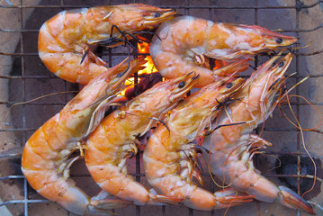 grilled shrimp arranged on stove