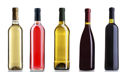 Obraz na płótnie Canvas Set of white, rose, and red wine bottles, isolated on white