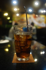 glass of cola with ice