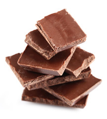 Dark chocolate pieces isolated on white