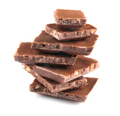 Milk chocolate pieces isolated on white