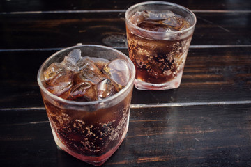 Cola with ice cubes