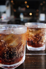 Cola with ice cubes
