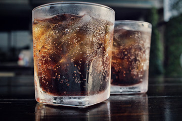 Cola with ice cubes