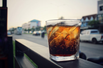 Cola with ice cubes