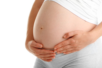Pregnant woman isolated on white background, close up