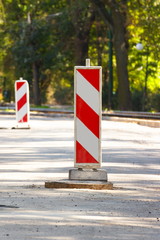 Road sign on city street informing about danger