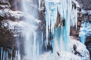 Frozen waterfall in the mountains.