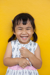 toothy smiling face of asian children good dental health