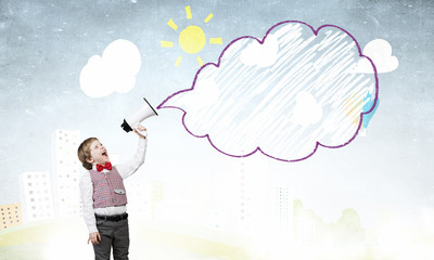 Kid boy with megaphone