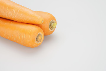 Pile of carrots placed in the upper left corner