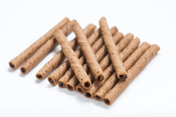 Chocolate wafer sticks isolated on white background.
