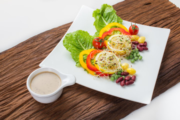 Delicious healthy salad on a dish.