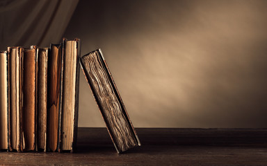 Ancient books on a shelf