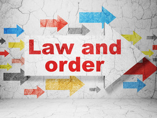 Obraz premium Law concept: arrow with Law And Order on grunge wall background
