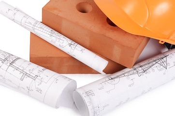 Building brick with a helmet