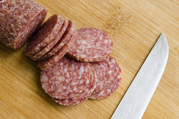 Slices of raw-smoked sausages