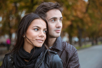 Couple looking away outdoors