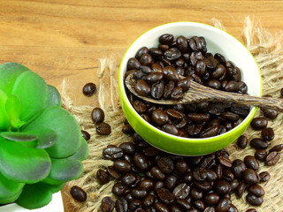 coffee beans on wooden background still life