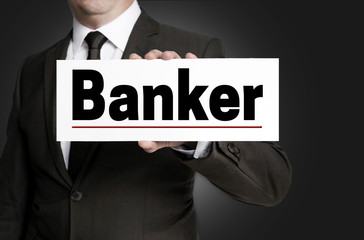 Banker sign is held by businessman concept