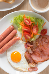 English breakfast on wood table. Top view.