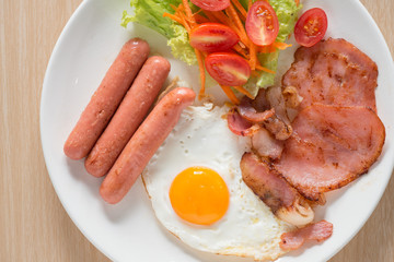 English breakfast on wood table. Top view.