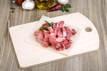 Raw pork meat pieces