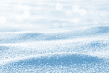 Winter background with snowdrifts and brilliant snow