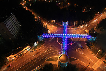 Modern bridge at crossroads on the night