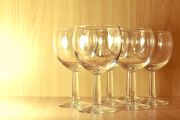 six empty wine glasses