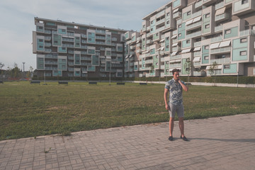 Young handsome man posing in the street