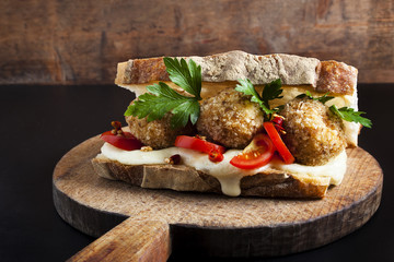 sandwich with risotto arancini balls and cheese mozzarella