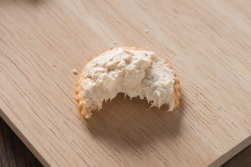 Tuna spread on cracker.