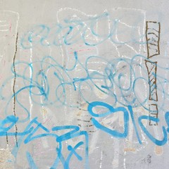 Concrete Graffiti Wall With Peeled Paint And Ripped Ads