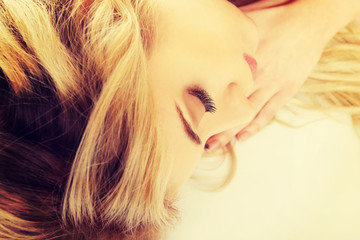 Naklejka premium Woman with closed eyes