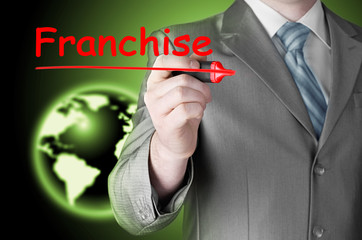 business man writing franchise