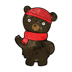 cartoon black bear in winter hat and scarf